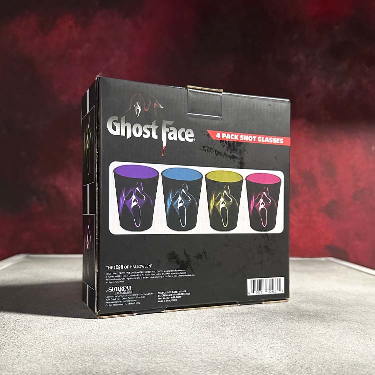 Ghost Face 4-pack shot glasses packaging with colorful shot glasses on a dark background