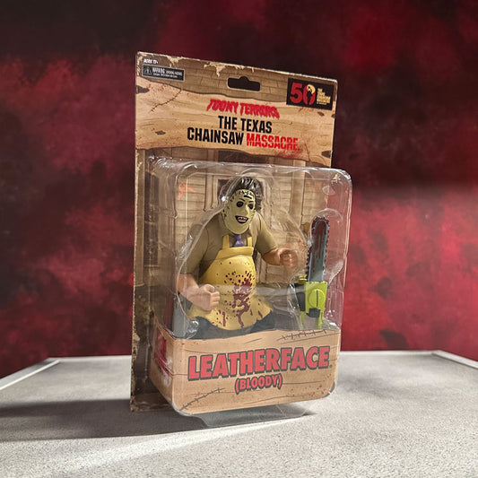 Texas Chainsaw Massacre 50th Anniversary Leatherface NECA toony terror figure in original packaging.